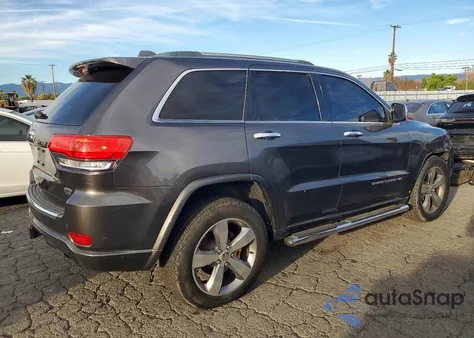 2014 Jeep Grand Cherokee Overland из США, поврежденный, VIN 1C4RJECT4EC201722